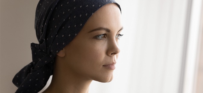 woman-with-cancer-wearing-a-head-scarf